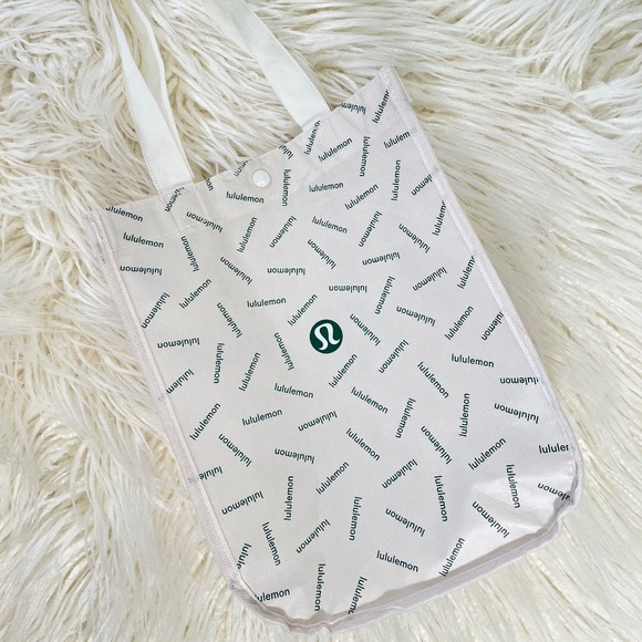 Lululemon Handbags - Lululemon "Lululemon reusable tote in white with logos" NWT